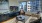 large windows brighten living room with city views